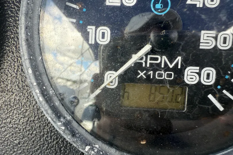 Slide: The Image of Close-up of a 2005 Carver 36 Sedan RPM gauge showing 4500 RPM. - 53