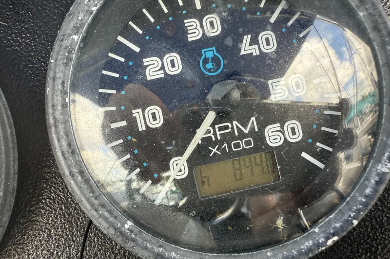 Slide: The Image of Close-up of a 2005 Carver 36 Sedan tachometer showing RPM and digital display. - 54