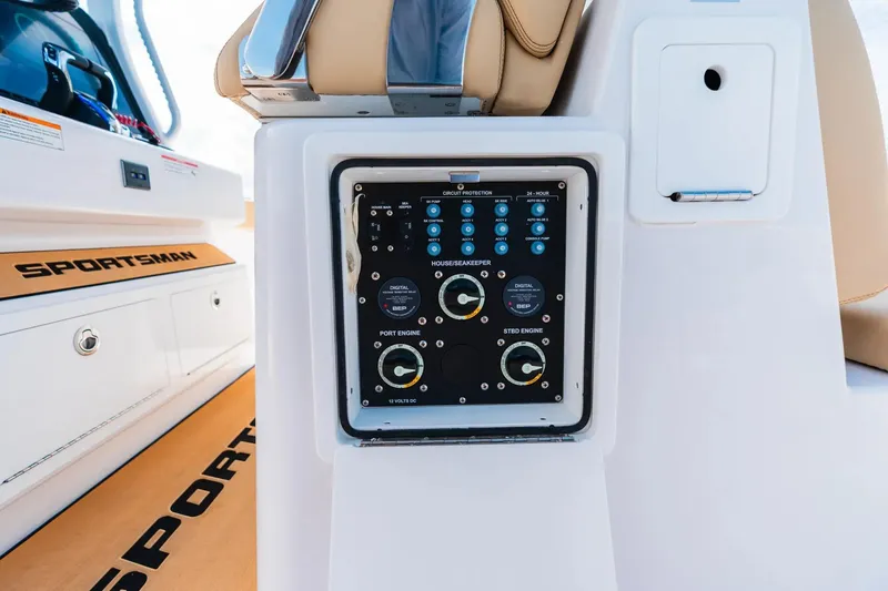 Slide: The Image of Control panel on 2026 Sportsman Heritage 321 Center Console boat interior. - 10