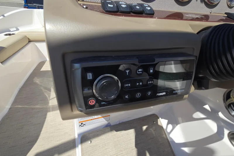 Slide: The Image of Fusion stereo system on 2015 Regal 1900 Bowrider boat dashboard. - 21