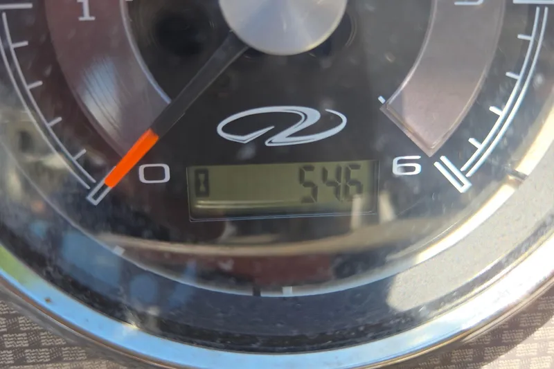 Slide: The Image of Close-up of a Regal 1900 Bowrider 2015 speedometer showing 546 hours. - 28