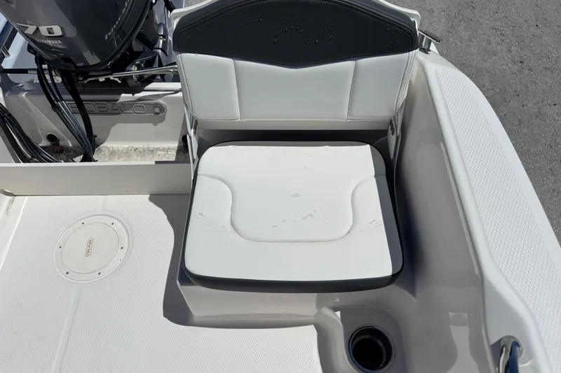 Slide: The Image of 2025 Robalo R160 Center Console boat seat and engine detail. - 17