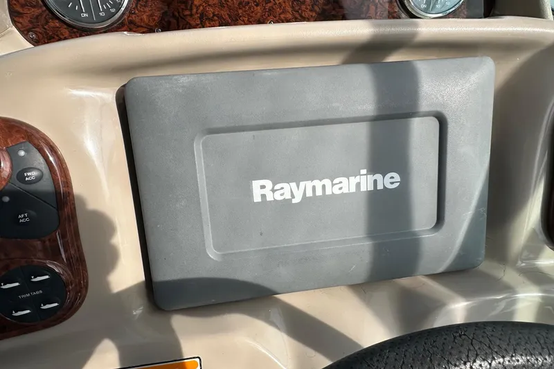 Slide: The Image of Dashboard of 2005 Sea Ray 300 Sundancer with Raymarine navigation system. - 6