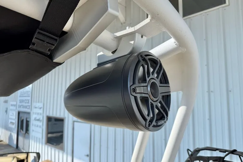 Slide: The Image of 2020 Nautique Super Air Nautique 230 boat speaker mounted on a white frame. - 21