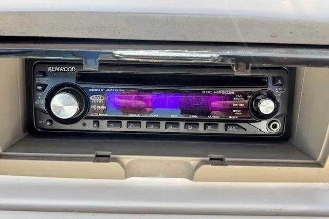 Slide: The Image of Kenwood stereo system in 2008 Stingray 185 LX boat dashboard. - 17