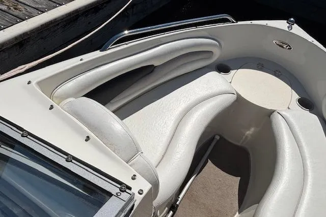 Slide: The Image of 2008 Stingray 185 LX boat interior with white seating and sleek design. - 9