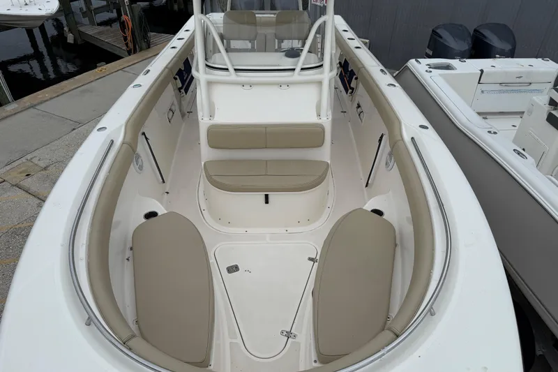 Slide: The Image of 2016 Pursuit C 280 Center Console boat with spacious seating and sleek design. - 10