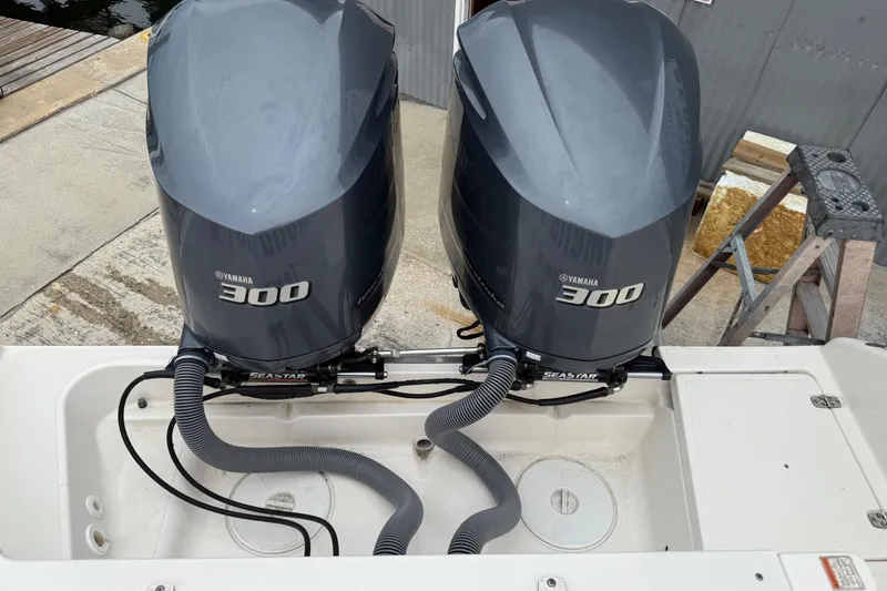 Slide: The Image of Twin Yamaha 300 engines on a 2016 Pursuit C 280 Center Console boat. - 20