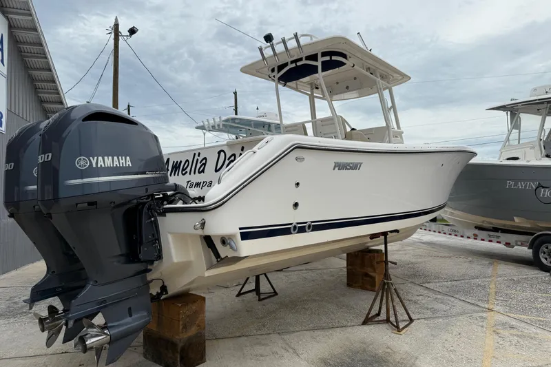 Slide: The Image of 2016 Pursuit C 280 Center Console boat with twin Yamaha engines on display. - 22