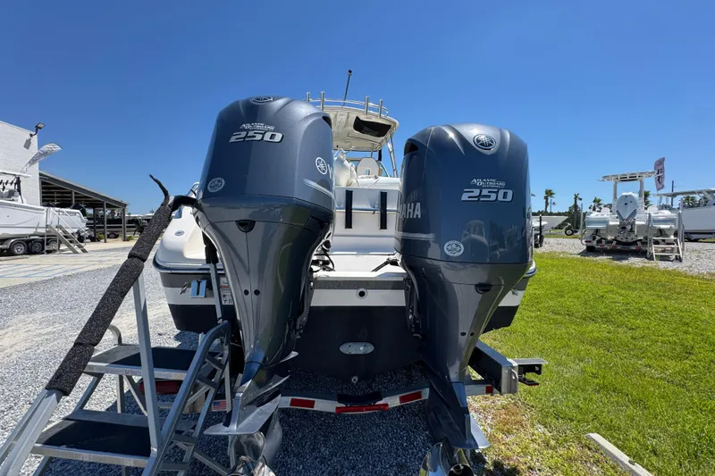Slide: The Image of 2015 Pursuit OS 285 Offshore boat with twin Yamaha 250 outboard engines. - 15