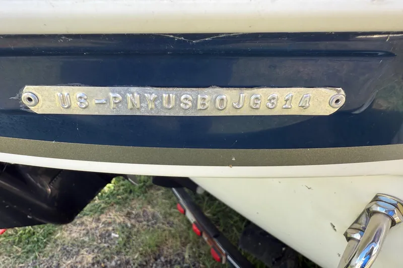 Slide: The Image of 2014 Stingray 208 LR boat with visible hull identification number. - 25