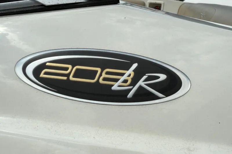 Slide: The Image of 2014 Stingray 208 LR logo on a white surface, featuring sleek design elements. - 5