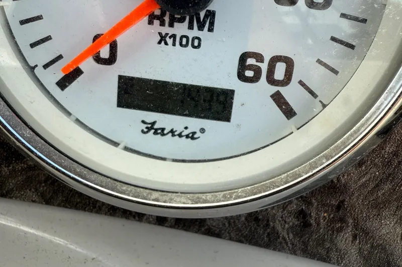 Slide: The Image of Close-up of a Faria tachometer in a 2014 Stingray 208 LR boat. - 9