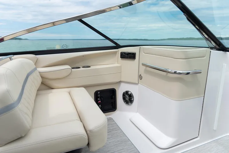 Slide: The Image of 2022 Regal 2800 Bowrider with luxurious white seating and spacious deck layout. - 15