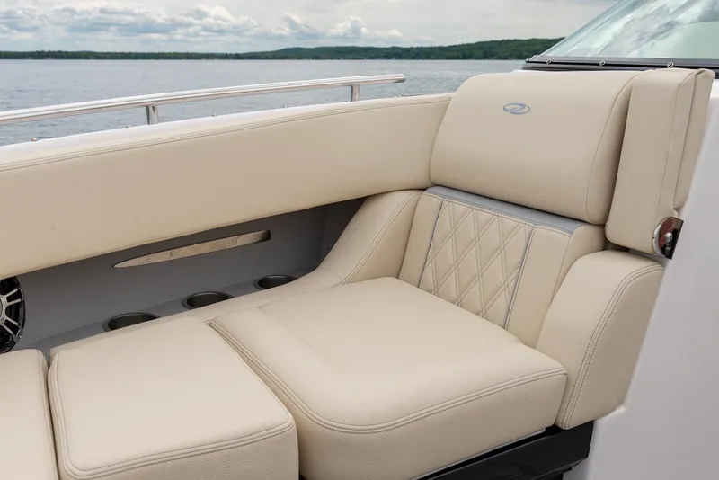 Slide: The Image of 2022 Regal 2800 Bowrider dashboard with controls and steering wheel detail. - 17