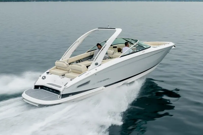 Slide: The Image of 2022 Regal 2800 Bowrider interior with luxurious white seating and sleek design. - 7
