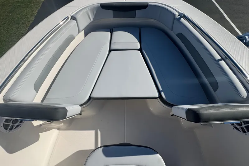 Slide: The Image of 2026 Robalo R202 Explorer boat interior with cushioned seating and sleek design. - 9