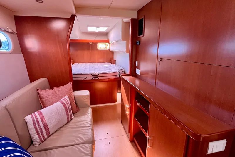 Slide: The Image of Luxurious interior of 2012 Leopard 47 PC Owners' Version yacht with cozy cabin and seating. - 23