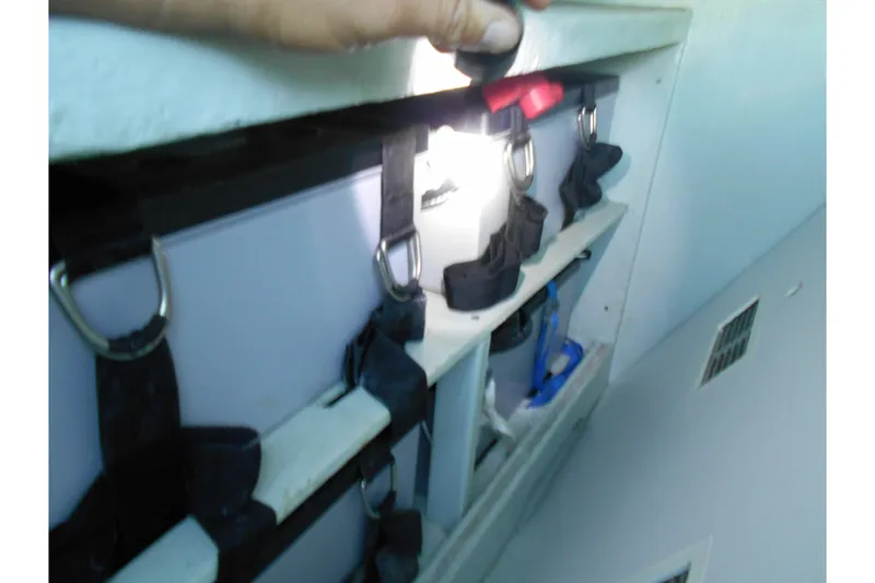 Slide: The Image of Interior view of a 2012 Leopard 47 PC Owners' Version yacht, showcasing storage compartments. - 48