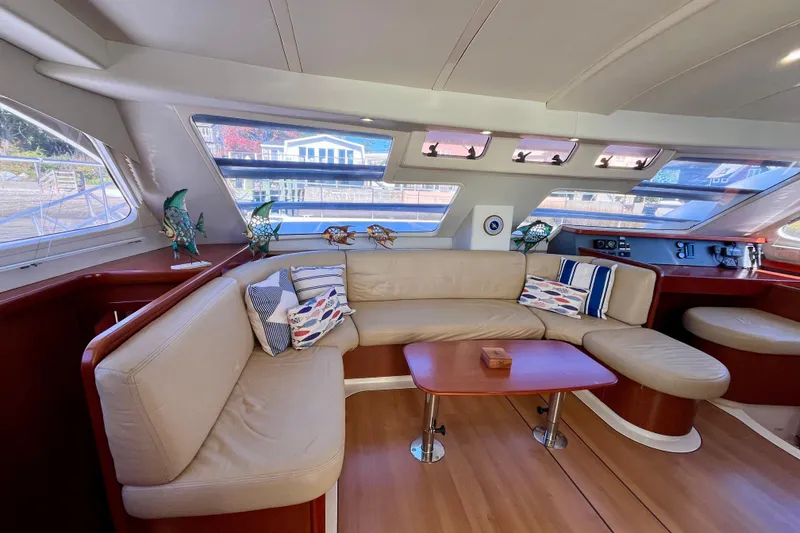Slide: The Image of Luxurious interior of 2012 Leopard 47 PC yacht with plush seating and decorative accents. - 5