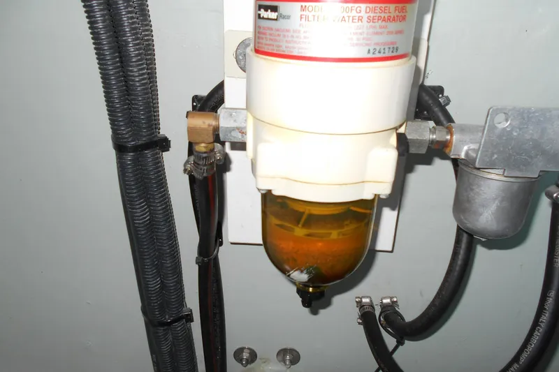 Slide: The Image of Diesel fuel filter and water separator in a 2012 Leopard 47 PC Owners' Version yacht. - 55