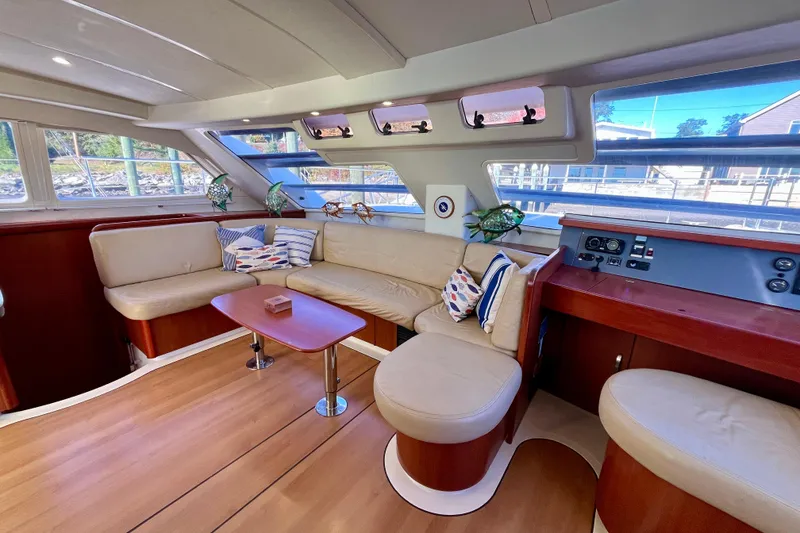 Slide: The Image of Luxurious interior of 2012 Leopard 47 PC yacht with plush seating and modern design. - 6