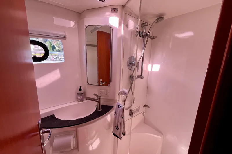 Slide: The Image of Bathroom interior of 2012 Leopard 47 PC Owners' Version yacht with shower and sink. - 65