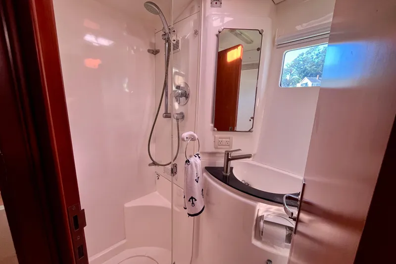 Slide: The Image of Bathroom interior of 2012 Leopard 47 PC Owners' Version yacht with shower and sink. - 67
