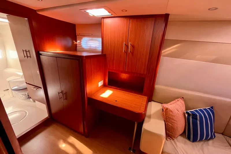 Slide: The Image of Luxurious interior of 2012 Leopard 47 PC yacht with wooden cabinetry and cozy seating. - 75