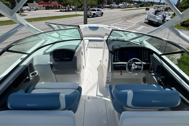 Slide: The Image of 2026 Robalo R317 Dual Console boat interior with modern dashboard and seating. - 10