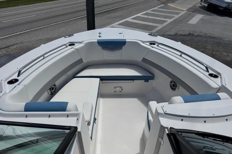 Slide: The Image of 2026 Robalo R317 Dual Console boat interior with spacious seating and modern design. - 24