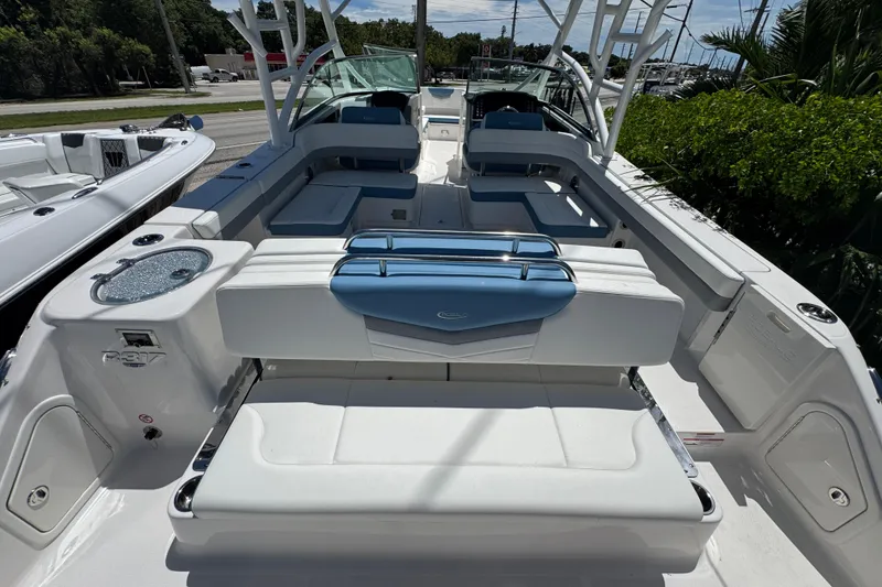 Slide: The Image of 2026 Robalo R317 Dual Console boat interior with seating and amenities. - 3