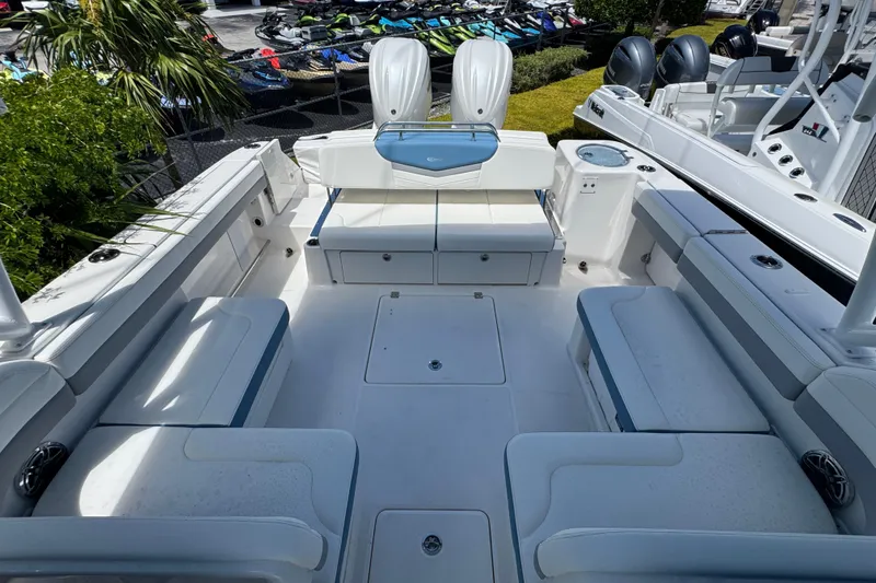 Slide: The Image of 2026 Robalo R317 Dual Console boat interior with spacious seating and modern design. - 31
