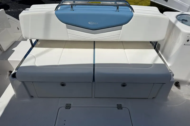 Slide: The Image of 2026 Robalo R317 Dual Console boat seating with storage compartments. - 5