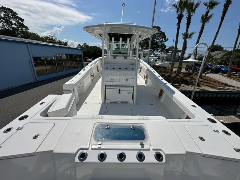 Slide: The Image of 2025 Caymas 34 CT boat with spacious deck and modern amenities. - 3
