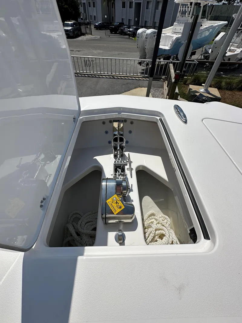 Slide: The Image of 2025 Caymas 34 CT boat anchor locker with ropes and anchor. - 7