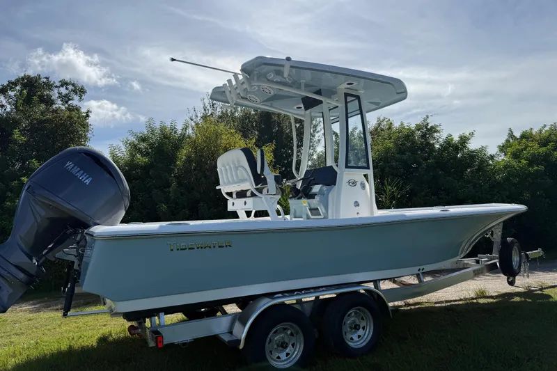 Slide: The Image of 2026 Tidewater 2210 Carolina Bay boat on trailer with Yamaha engine. - 2