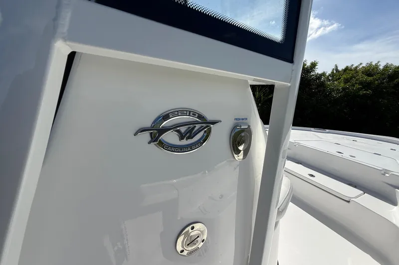 Slide: The Image of 2026 Tidewater 2210 Carolina Bay boat emblem and fresh water access. - 36