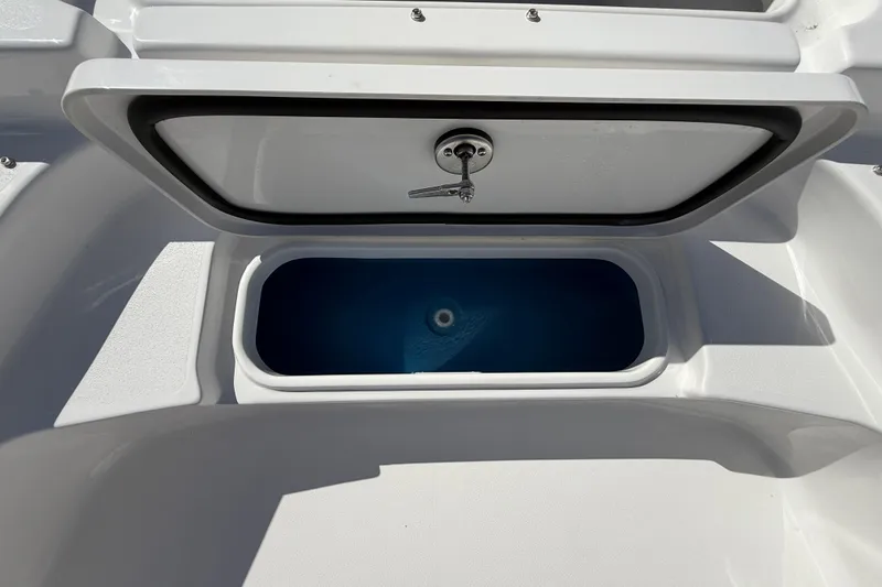 Slide: The Image of Open storage compartment on 2026 Tidewater 2210 Carolina Bay boat. - 42