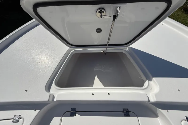 Slide: The Image of Open storage compartment on 2026 Tidewater 2210 Carolina Bay boat. - 44