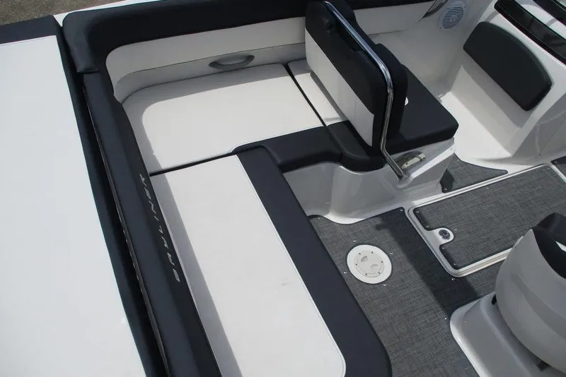 Slide: The Image of 2022 Bayliner VR5 Bowrider I/O interior with sleek seating and modern design. - 7