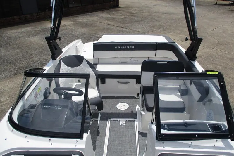 Slide: The Image of 2022 Bayliner VR5 Bowrider I/O interior with seating and steering wheel. - 8