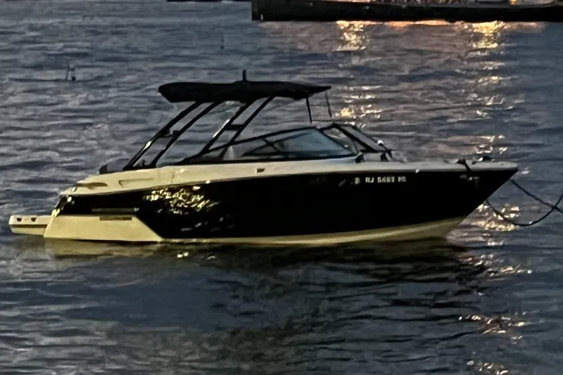 The Image of 2018 Monterey 258 Super Sport boat on water at dusk. - 0