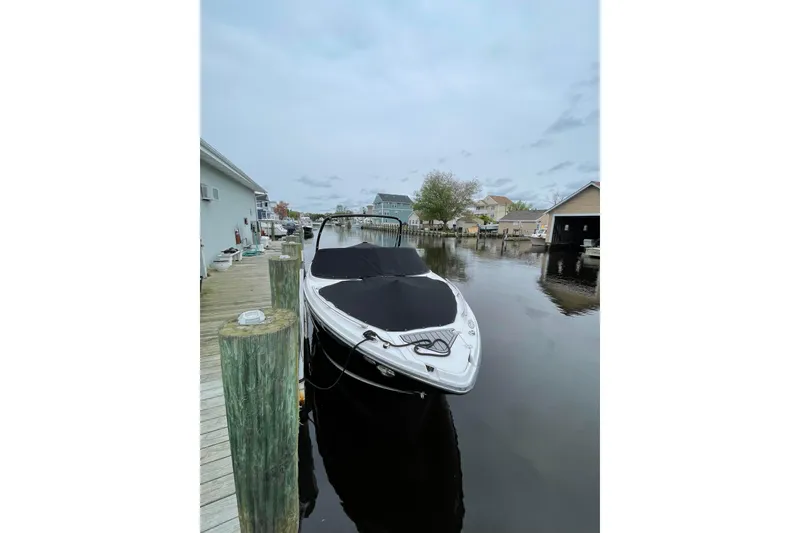 Slide: The Image of 2018 Monterey 258SS Super Sport boat covered in protective wrap, elevated on stands. - 3