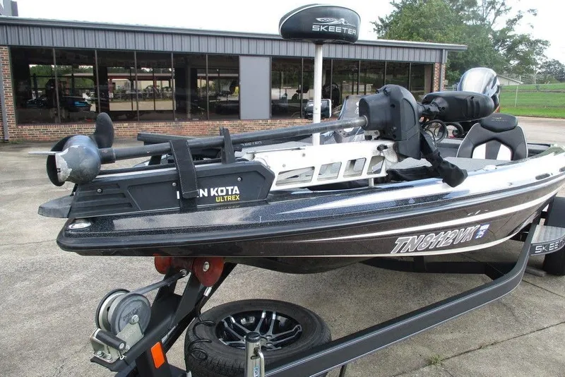 Slide: The Image of 2020 Skeeter ZX150 boat with Minn Kota Ultrex motor on trailer. - 3