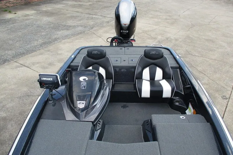Slide: The Image of 2020 Skeeter ZX150 boat interior with Lowrance electronics and dual seating. - 5