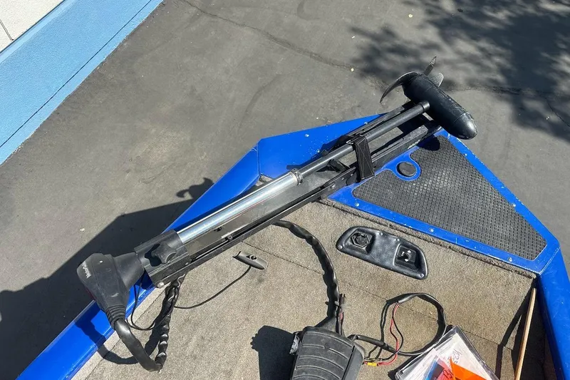 Slide: The Image of 2005 Bass Tracker Pro Team 175 boat with trolling motor on deck. - 20