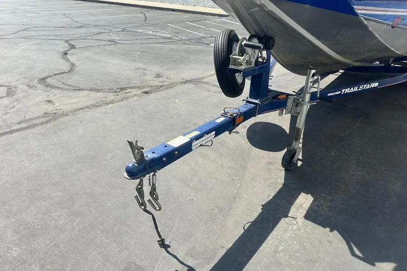 Slide: The Image of 2005 Bass Tracker Pro Team 175 boat trailer hitch on asphalt parking lot. - 5