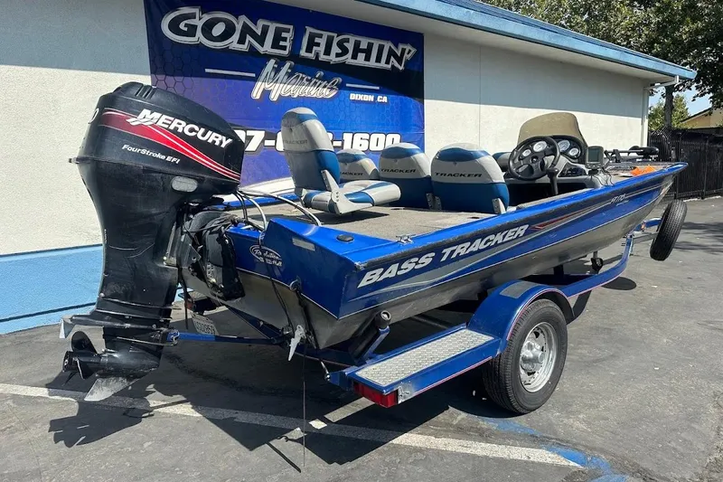 Slide: The Image of 2005 Bass Tracker Pro Team 175 boat with Mercury FourStroke EFI engine, parked outside dealership. - 9