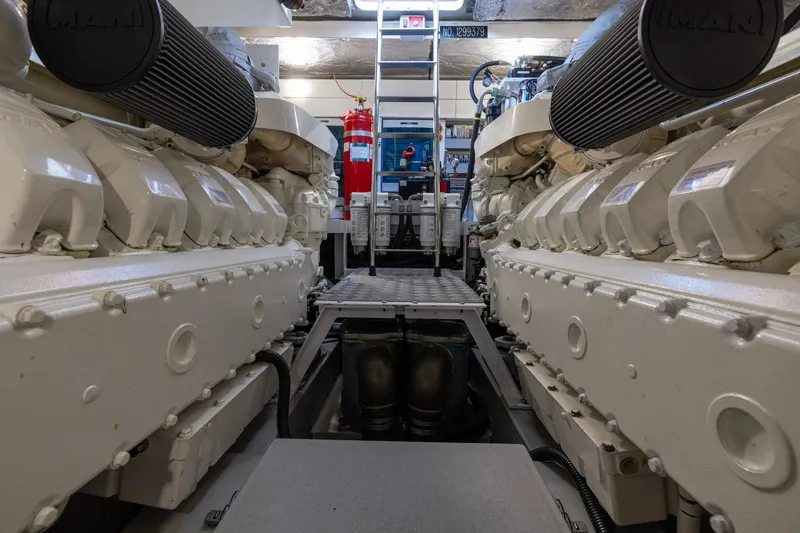 Slide: The Image of Engine room of 2020 Sunseeker Predator 74 yacht, featuring dual MAN engines. - 28